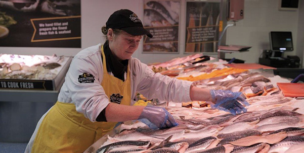 Kish Fish employee in a shop